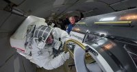 Water Leak Aborts Spacewalk, Casting Doubt on Aging Suit Program